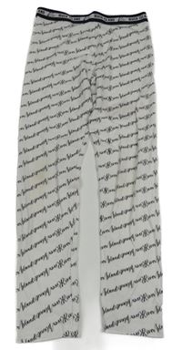 Černé legíny s nápisy River Island