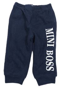 Tmavomodré žebrované tepláky s nápisem 