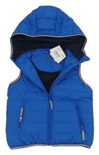 Nové - Modrá šusťáková zateplená vesta s kapucí Topolino