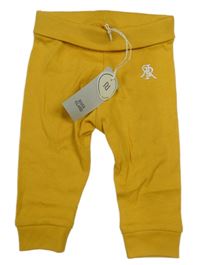 Nové - žluté lehké tepláky s výšivkou River Island