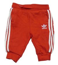 Červené tepláky Adidas
