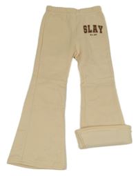 Béžové flare tepláky s nápisem Shein