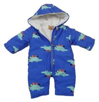 Modrá šusťáková zateplená kombinéza s dinosaury a kapucí