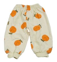 Smetanové tepláky s pomeranči 