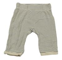 Světlebéžovo-tmavomodré pruhované tepláky H&M