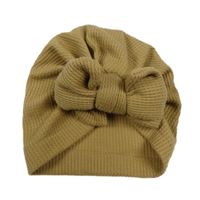 Hnědobéžová vzorovaná turbanová čepice s mašlí 