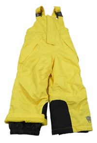 Žluto-černé šusťákové zimní laclové oteplovačky s medvídkem lupilu