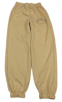 Béžové tepláky s nápisem Shein