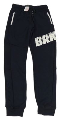 Nové - Tmavomodré tepláky s nápisem Primark