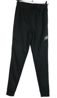 Pánské tmavošedé sportovní tepláky New Balance 