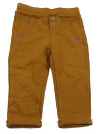 Hnědé melírované pletené tepláky OBaïBi