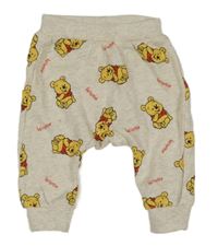 Světlebéžové melírované turecké tepláky s Pú H&M