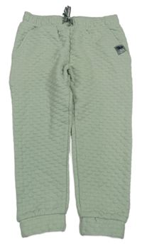 Světlezelené puntíkaté tepláky Kids