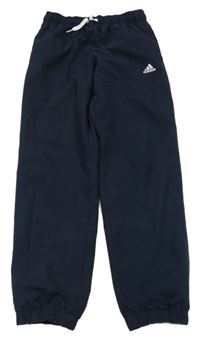 Tmavomodré šusťákové kalhoty s logem Adidas