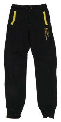 Černo-žluté tepláky s nápisem L&D