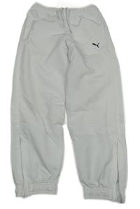 Bílé šusťákové podšité kalhoty s logem Puma 
