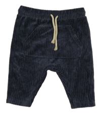 Tmavomodré žebrované sametové kalhoty s kapsou Zara