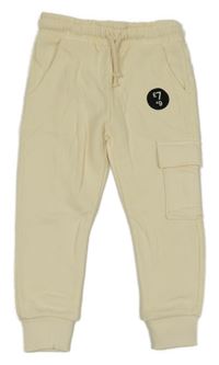 Nové - smetanové tepláky s kapsou F&F