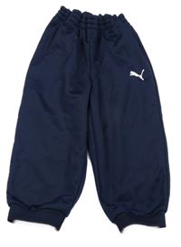 Tmavomodré sportovní tepláky s logem Puma