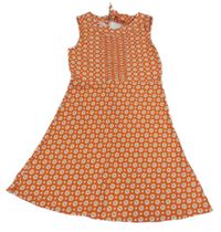 Oranžovo-bílé vzorované šaty 