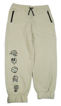 Béžové tepláky s příšerkami M&S