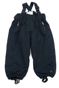 Tmavomodré šusťákové zimní oteplovačky s kšandami Topomini