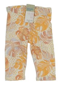 Nové - smetanovo-oranžové legíny s lístečky PRIMARK