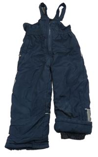 Tmavomodré šusťákové zimní oteplovačky s kšandami