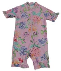 Růžový UV overal s kytičkami a volánky Next