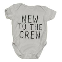 Bílé body s nápisy NUTMEG