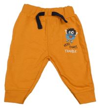 Oranžové tepláky s příšerkou Dopodopo