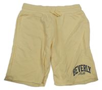 Vanilkové teplákové kraťasy s nápisem H&M