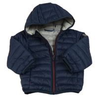 Tmavomodrá šusťáková prošívaná zateplená bunda s kapucí 