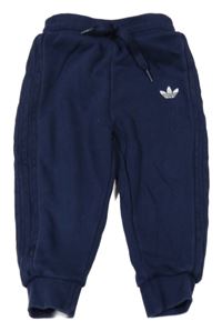 Tmavomodré tepláky s logem Adidas