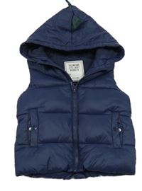 Tmavomodrá šusťáková zateplená vesta s kapucí s ostny Matalan