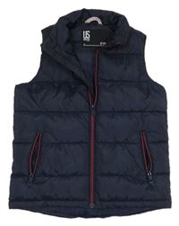 Tmavomodrá šusťáková zateplená vesta 