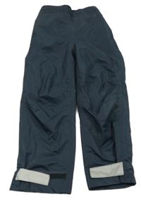 Tmavomodré šusťákové podšité kalhoty s reflexními prvky tcm