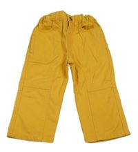 Žluté plátěné kalhoty 