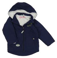 Tmavomodrá šusťáková jarní bunda s nápisem a kapucí 