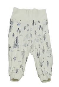 Bílé tepláky se stromečky a domečky a zvířátky lupilu