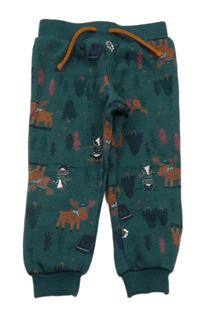 Tmavozelené tepláky se stromy a soby Primark