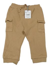 Nové - Béžové žerované cargo tepláky Tu