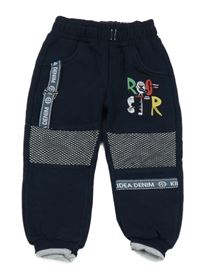 Tmavomodré tepláky s příšerkami a síťovinou