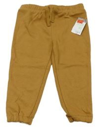 Nové - Okrové tepláky Primark