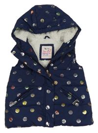 Tmavomodrá puntíkatá šusťáková zateplená vesta s kapucí TU