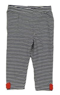 Tmavomodro-bílé pruhované legíny s mašličkami