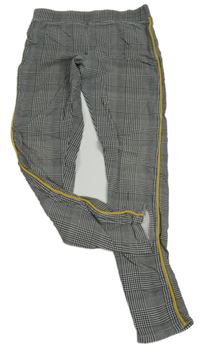 Černo-bílo-hořčicové kostkované legíny s pruhy H&M