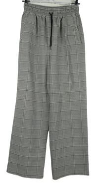 Dámsé bílo-černé kostkované volné kalhoty Topshop 