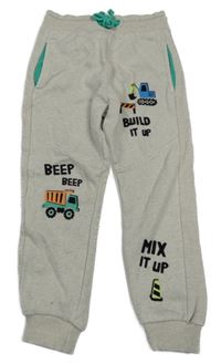 Světklebéžové tepláky s bargem a nápisy Nutmeg