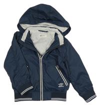 Tmavomodrá šusťáková jarní bunda s kapucí H&M